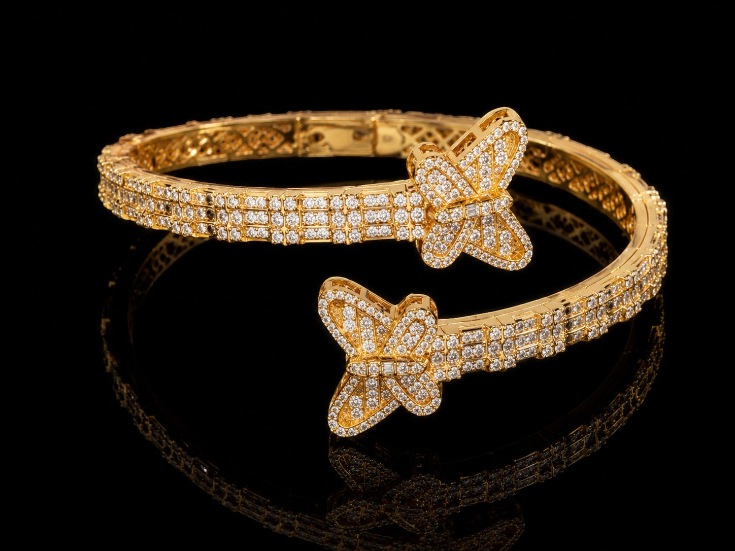 Petey's jewelry gold-plated sterling silver butterfly bangle bracelet featuring sparkling VVS moissanite stones.