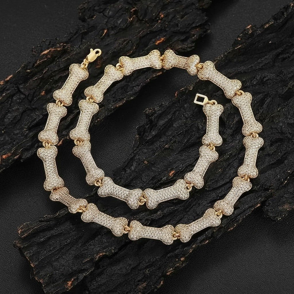 Petey's jewelry iced out bone-shaped link chain necklace in gold-plated brass with sparkling zircon stones