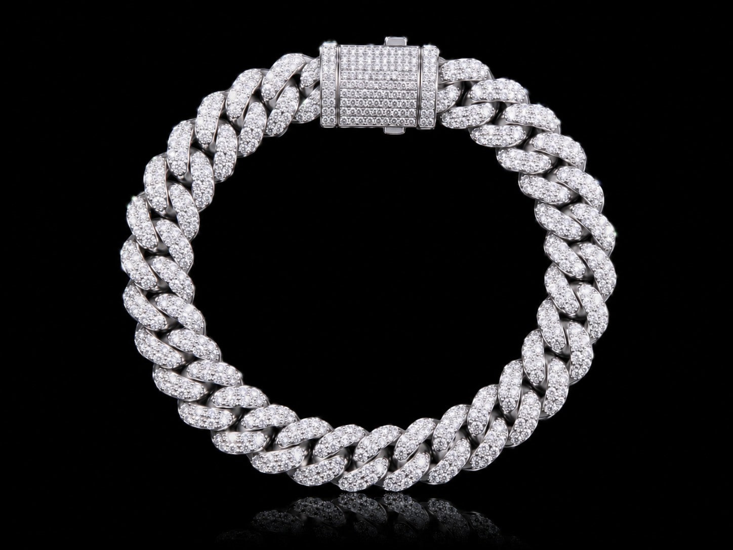 Petey's jewelry iced out Cuban link chain in S925 sterling silver featuring sparkling VVS moissanite diamonds.