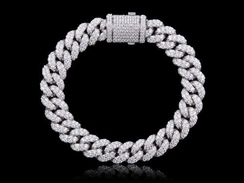 Petey's jewelry iced out Cuban link chain in S925 sterling silver featuring sparkling VVS moissanite diamonds.
