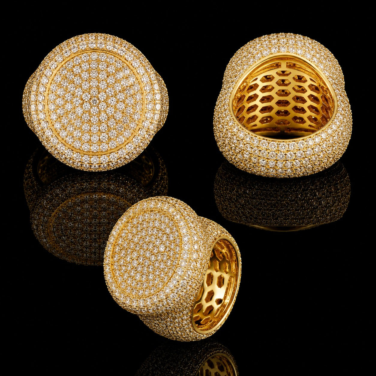 Petey's jewelry iced out hip hop ring featuring round brilliant cut VVS moissanite stones set in gold-plated 925 silver.