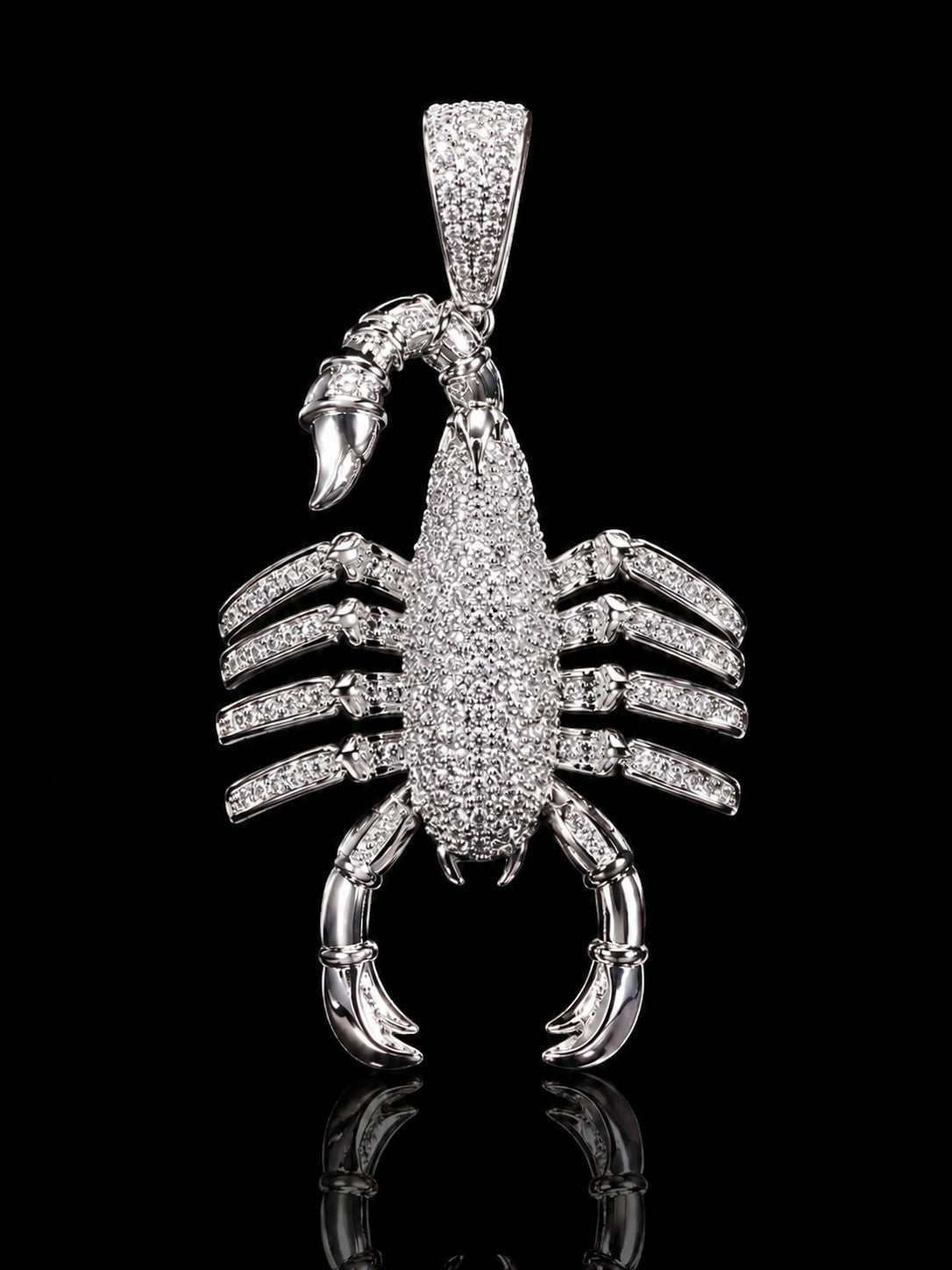 Petey's jewelry silver-toned iced-out scorpion pendant featuring micro-set zirconia stones on a black background.