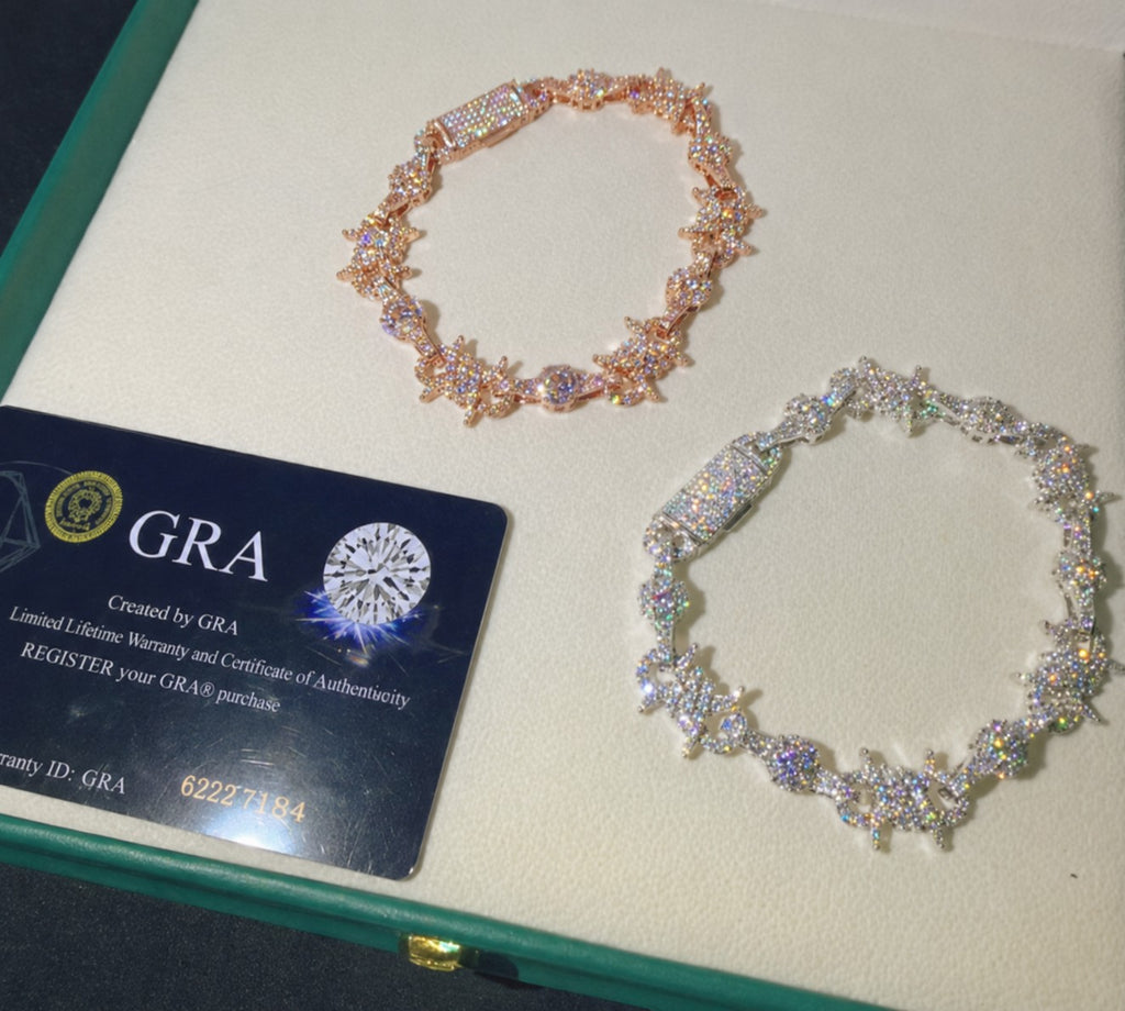 Petey's jewelry iced out barbed wire link bracelets in rose gold and silver with VVS moissanite and GRA certificate.