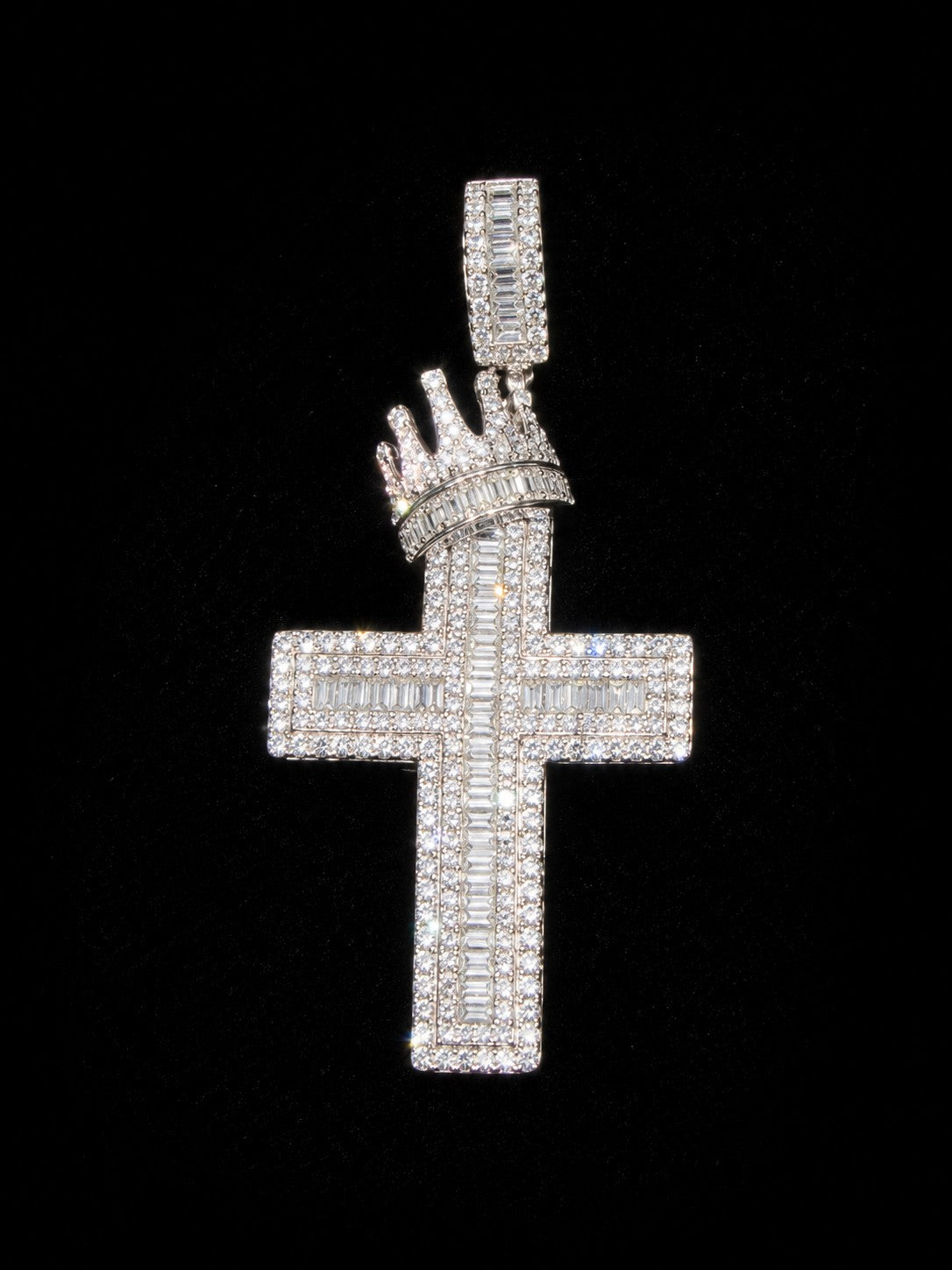 Petey's jewelry hip hop cross pendant in 925 sterling silver with sparkling moissanite stones and a crown detail.