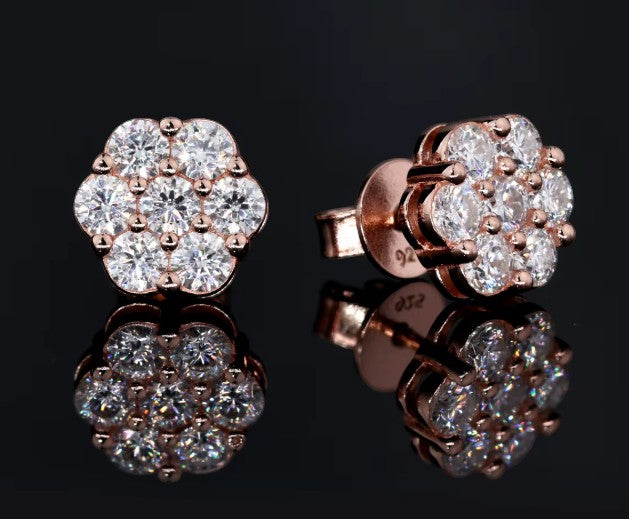 Petey's jewelry iced out flower cluster stud earrings featuring sparkling moissanite diamonds set in rose gold 925 silver.