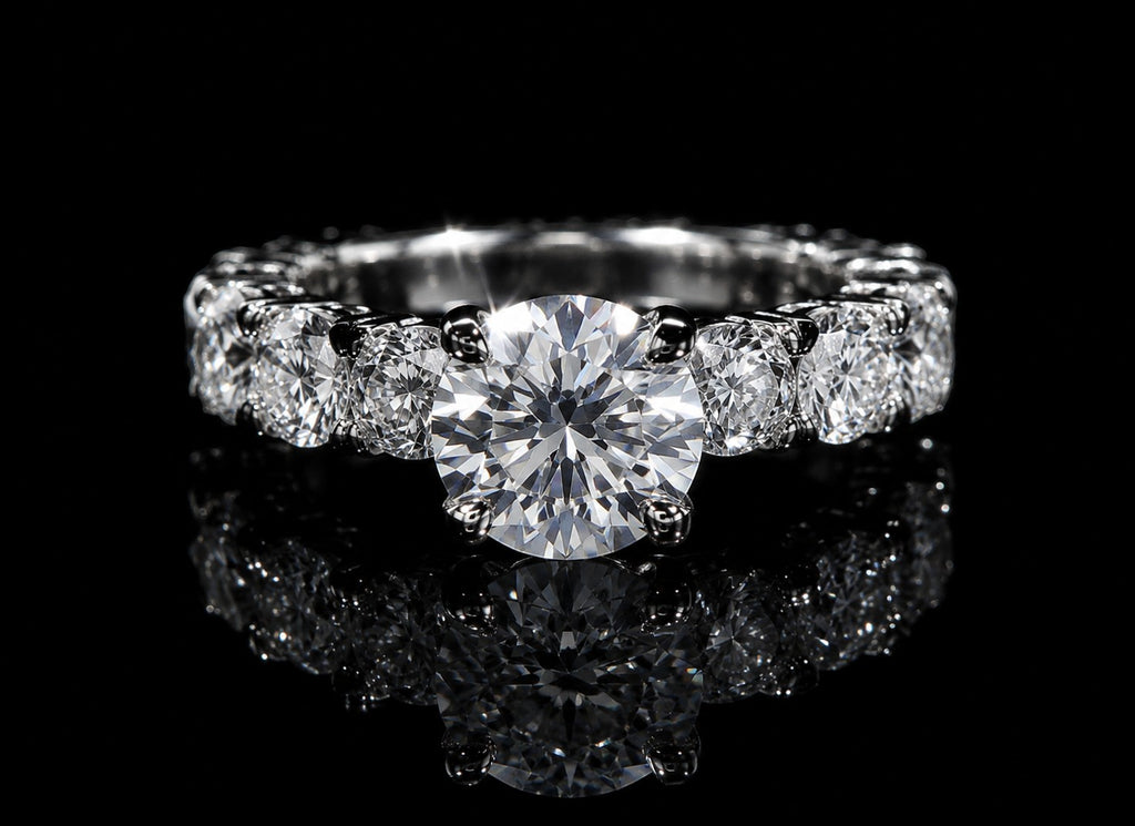 Petey's jewelry women's sterling silver ring with a large round moissanite center stone and smaller stones along the band.