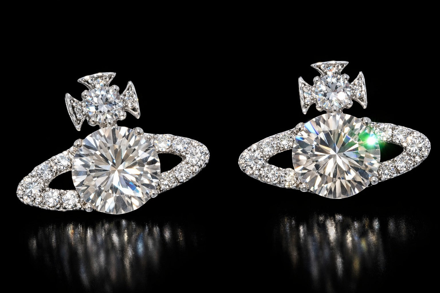 Petey's jewelry planet stud earrings in 925 sterling silver with sparkling VVS moissanite stones on black background