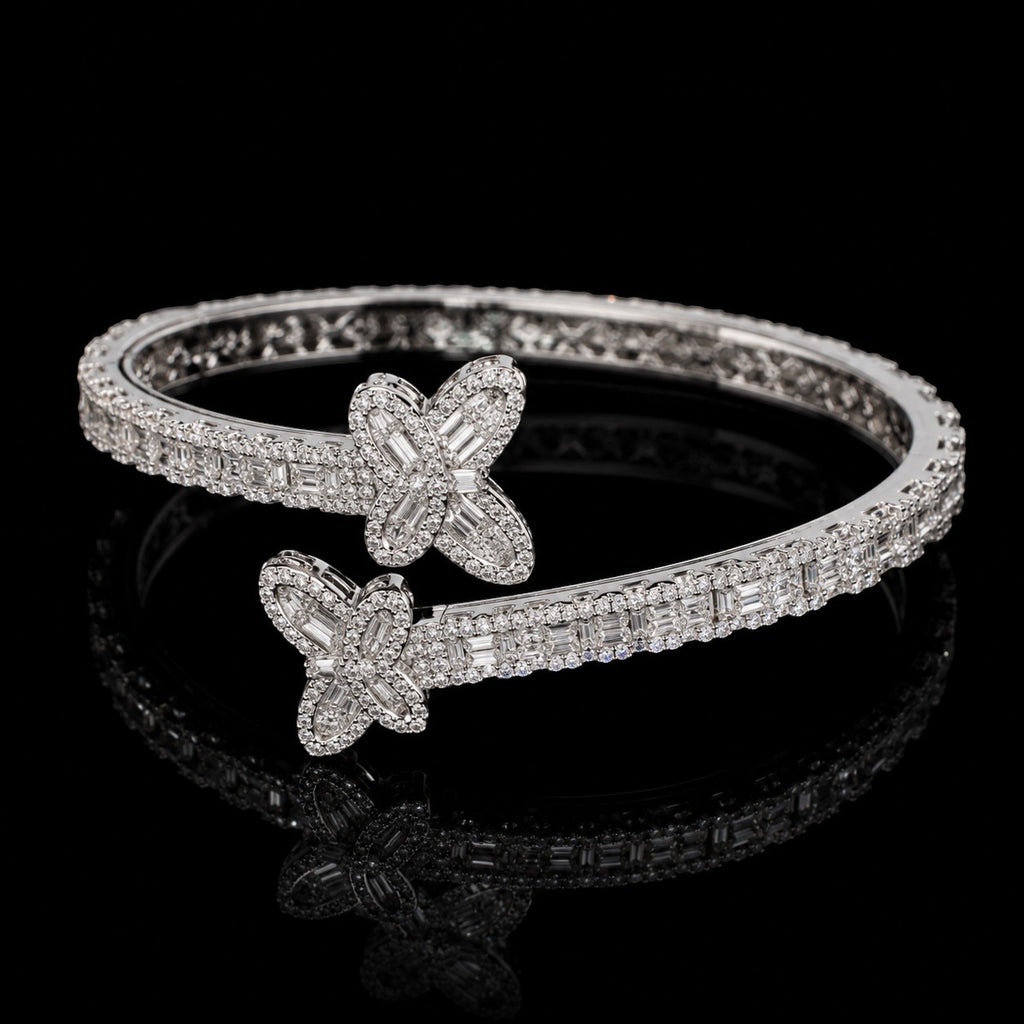 Petey's jewelry 925 sterling silver hip hop bangle featuring emerald cut VVS moissanite stones in a butterfly design.
