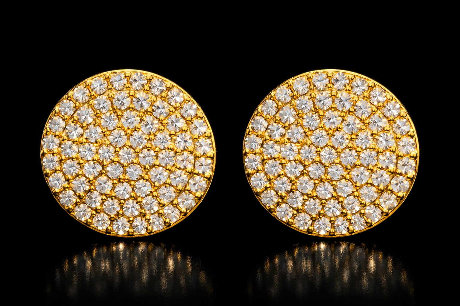 Petey's jewelry 10mm round stud earrings in gold-plated 925 sterling silver with VVS moissanite stones.