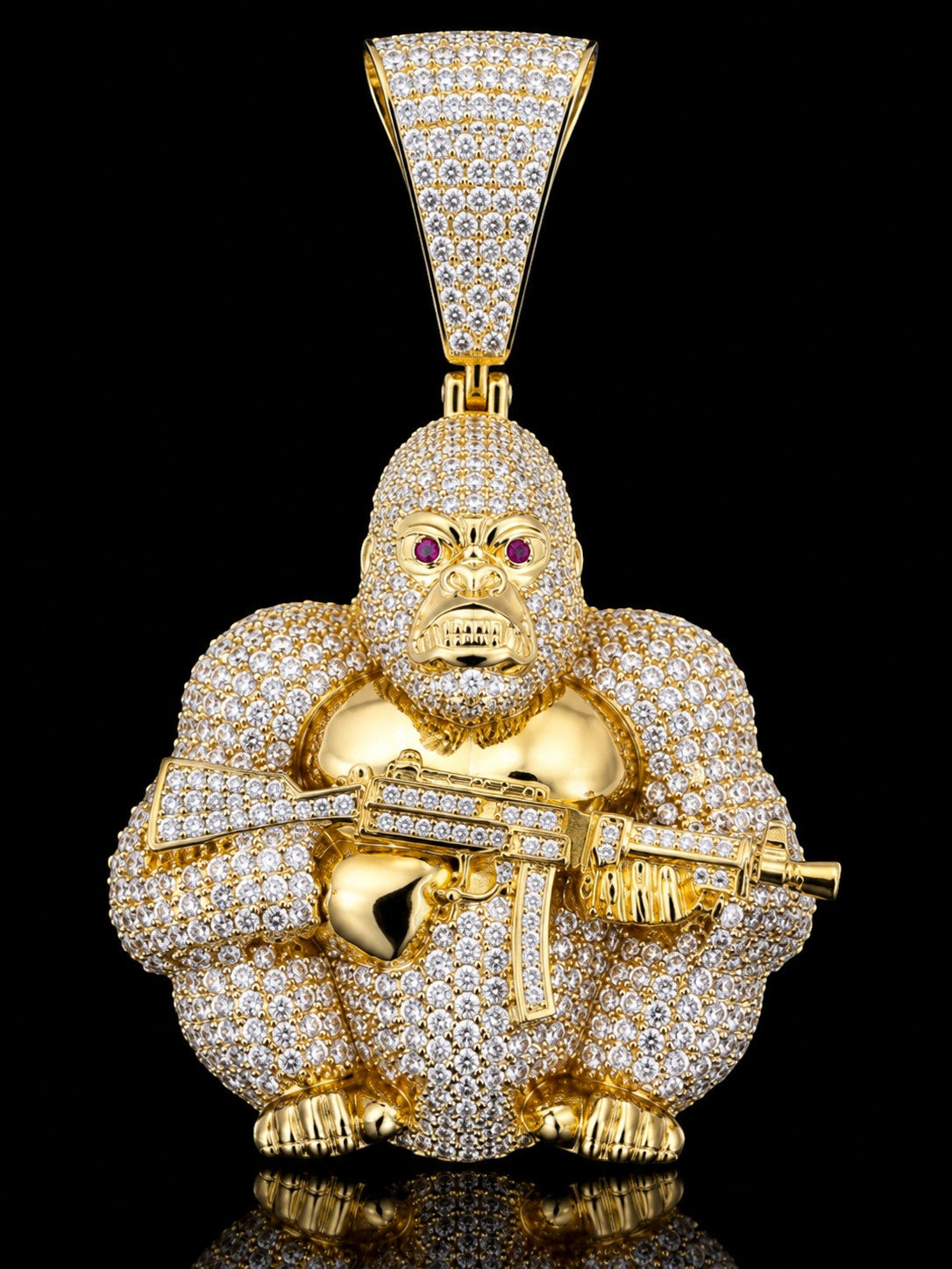 Petey's jewelry gold-plated gorilla pendant with iced-out VVS moissanite diamonds, red stone eyes, and rifle detail.