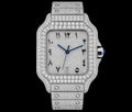 Petey's jewelry men's iced out automatic watch with square silver dial, blue hands, date window, and diamond-encrusted bezel and band.