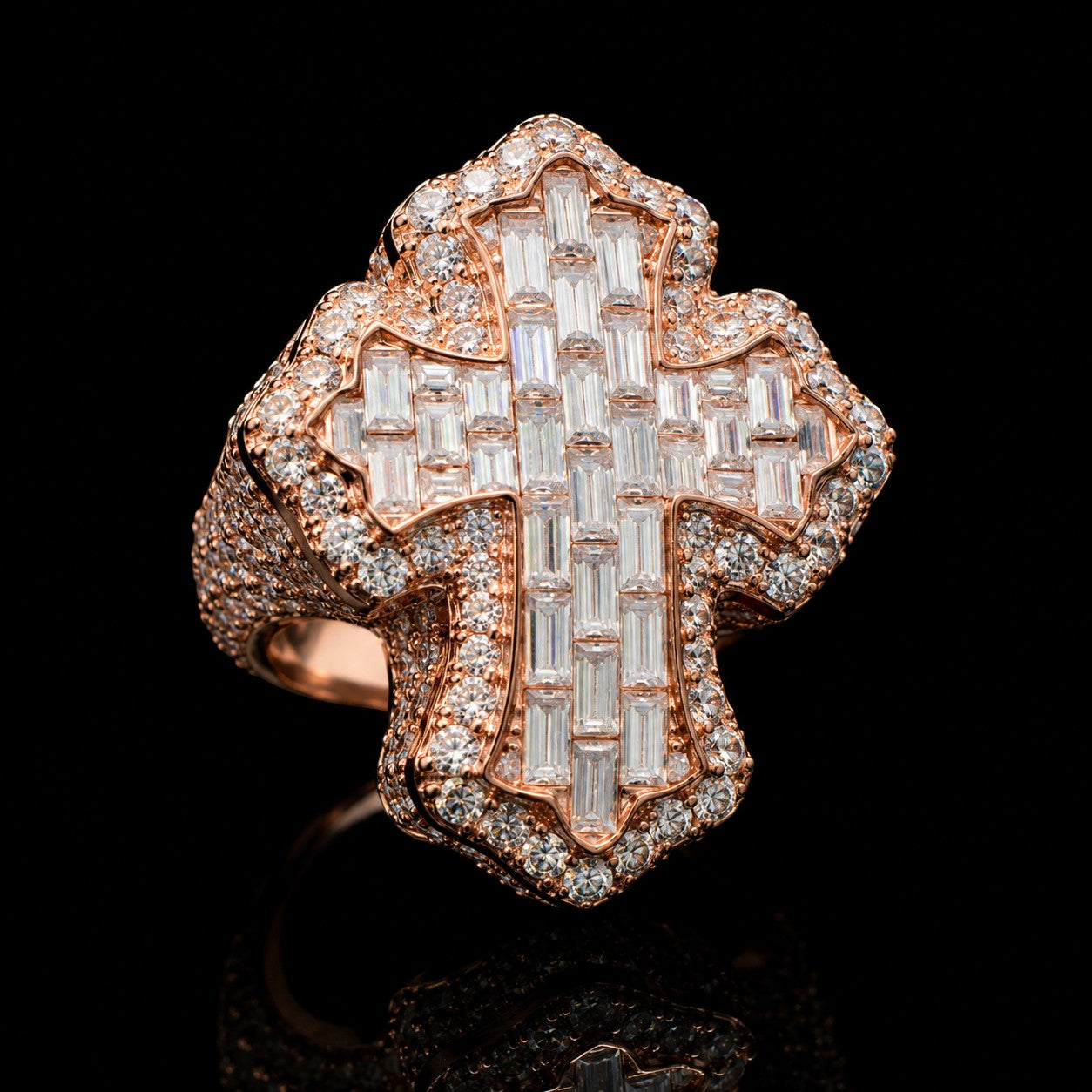 Petey's jewelry iced out cross ring featuring baguette-cut moissanite stones set in rose gold-plated sterling silver.