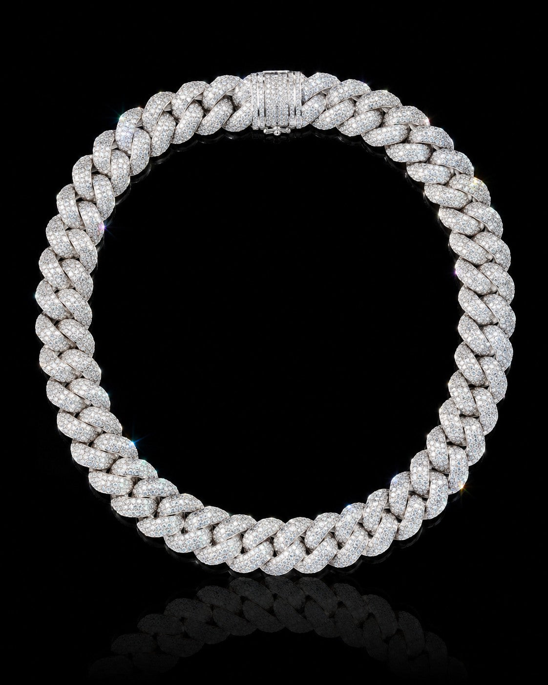 Petey's jewelry iced out Cuban link chain in S925 silver, featuring sparkling VVS moissanite stones in a hip-hop style.