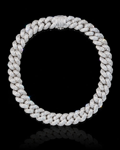 Petey's jewelry iced out Cuban link chain in S925 silver, featuring sparkling VVS moissanite stones in a hip-hop style.