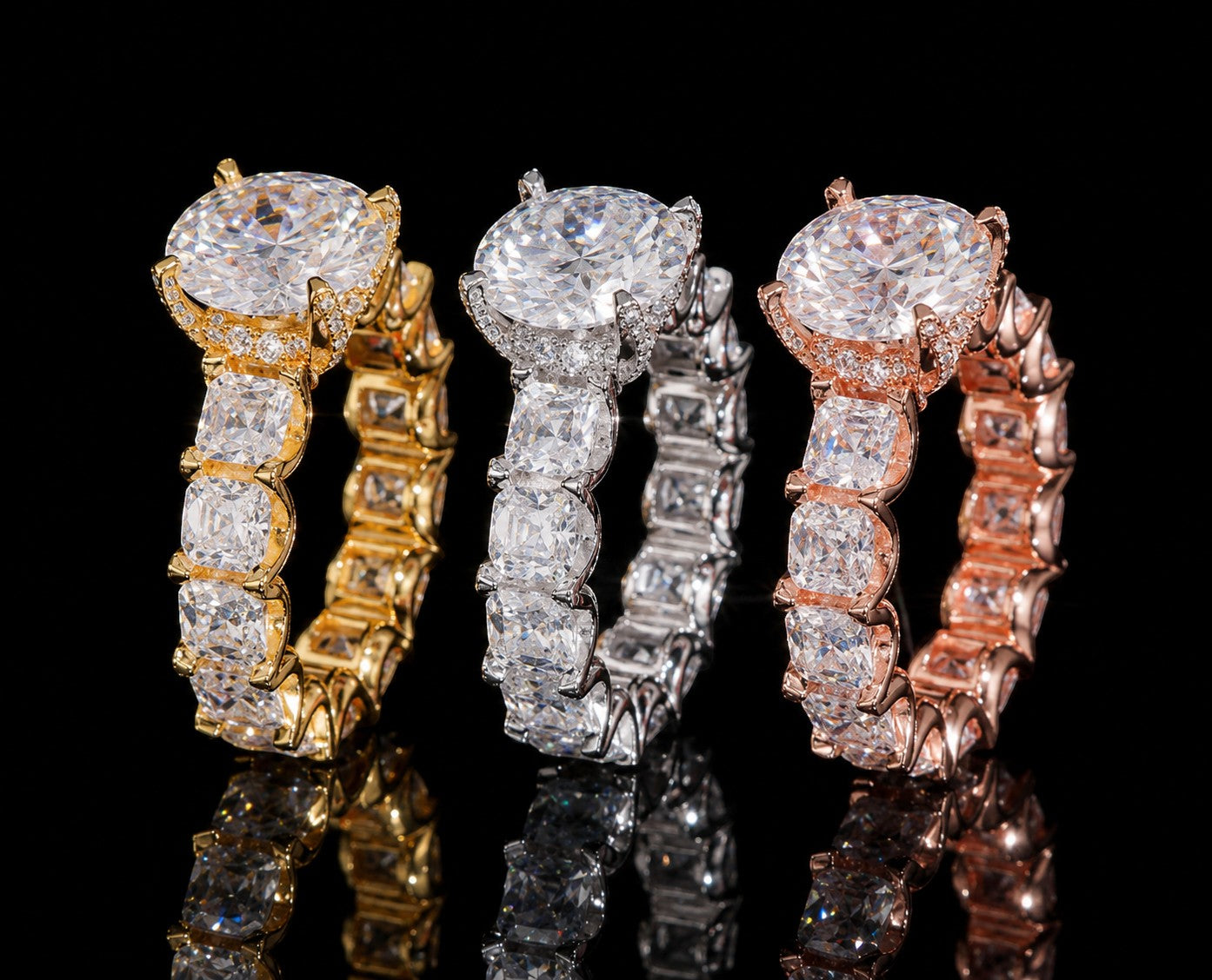 Petey's jewelry luxury women's iced out moissanite ring in gold, silver, and rose gold finishes. Features round cut center stone and square cut band.