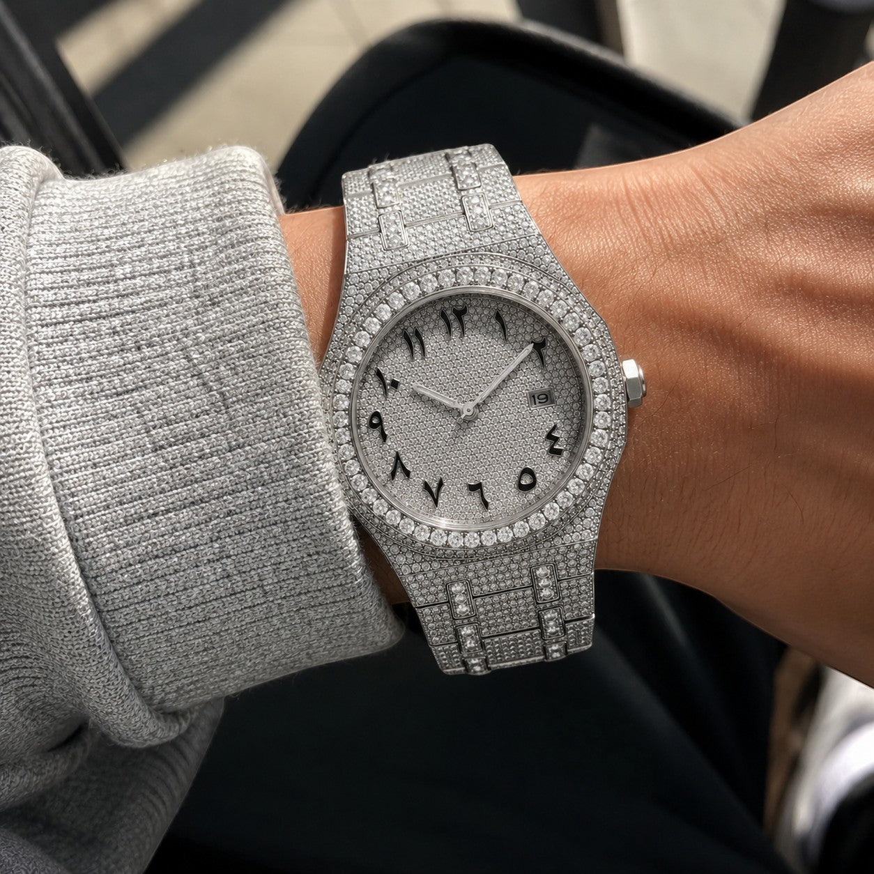 Petey's jewelry iced out automatic mechanical watch with VVS moissanite, stainless steel band, and Arabic numerals on dial.