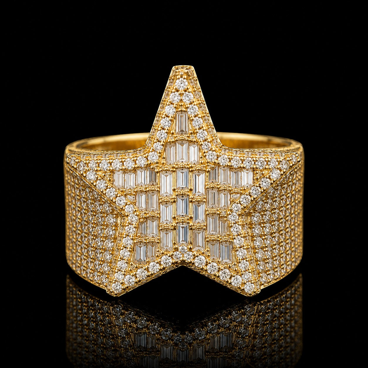 Petey's jewelry iced out star-shaped ring in gold-plated 925 silver with VVS moissanite baguette and round stones.