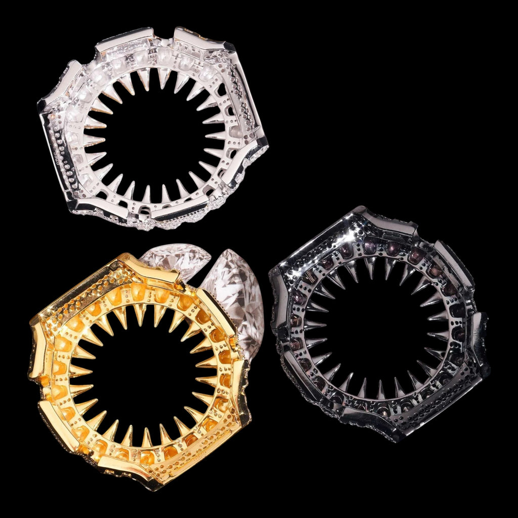 Petey's jewelry three iced out watch bezels in silver, gold, and gunmetal with moissanite stones. Unique shark tooth design.