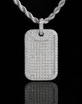 Petey's jewelry iced out dog tag pendant featuring VVS moissanite diamonds on a white gold plated 925 silver rope chain.