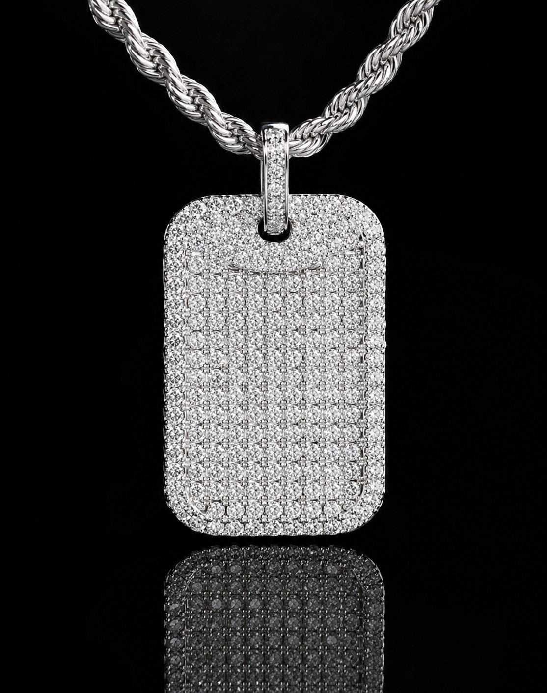 Petey's jewelry iced out dog tag pendant featuring VVS moissanite diamonds on a white gold plated 925 silver rope chain.