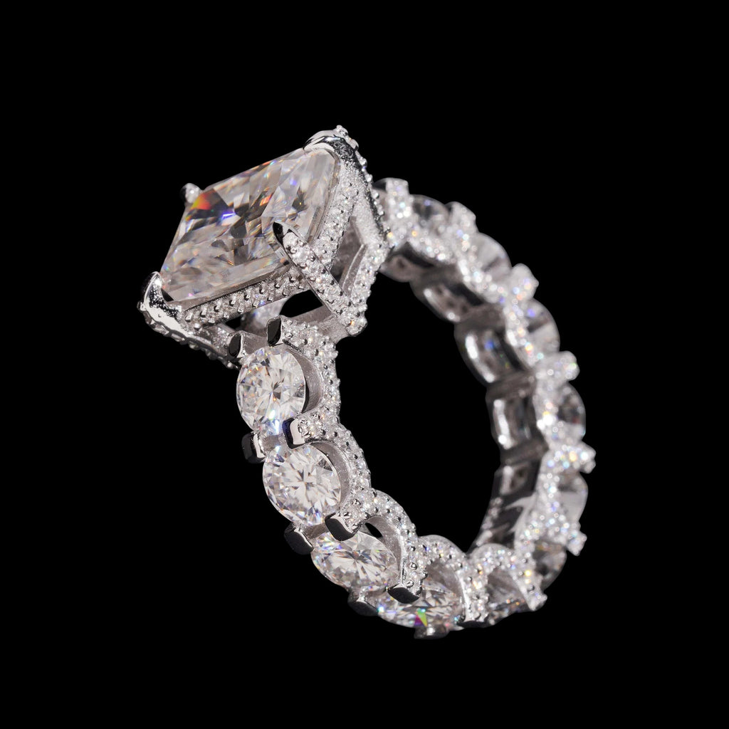 Petey's jewelry radiant cut moissanite eternity engagement ring in sterling silver with pave setting.