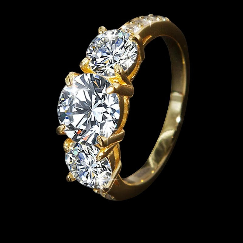 Petey's jewelry 18K gold white color S925 sterling silver ring with three round brilliant cut moissanite stones.