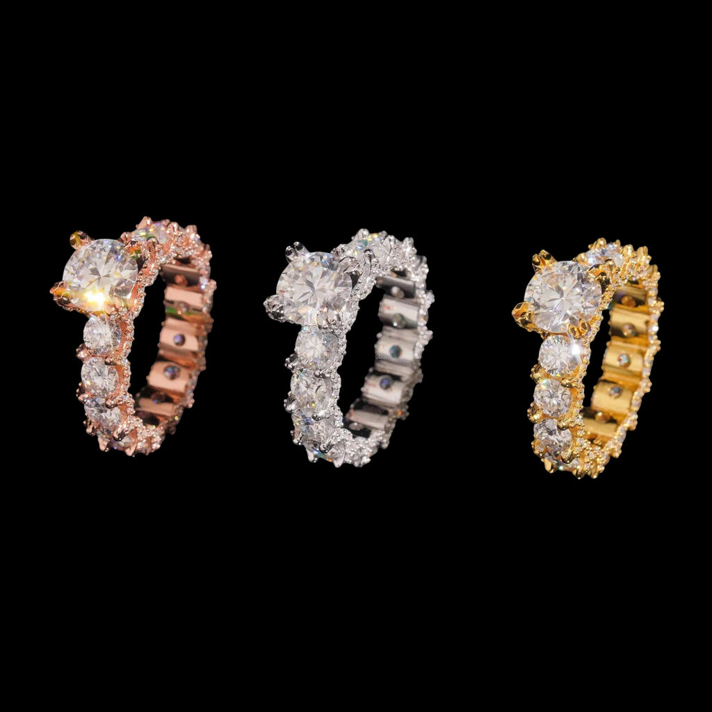 Petey's jewelry luxury women's VVS moissanite ring in rose gold, silver, and gold finishes. Full diamond band with round brilliant cut stones.