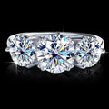 Petey's jewelry three-stone moissanite ring in sterling silver, round brilliant cut, D color, VVS clarity, 4CT.