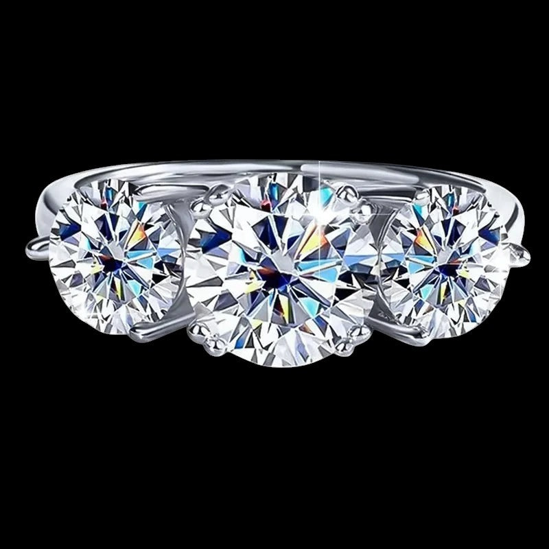 Petey's jewelry three-stone moissanite ring in sterling silver with round brilliant cut stones.