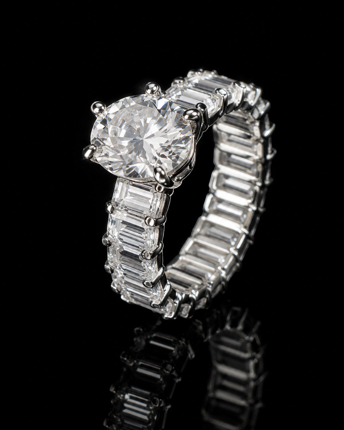 Petey's jewelry luxury women's ring with a large round VVS moissanite center stone and a band of baguette-cut moissanite stones.